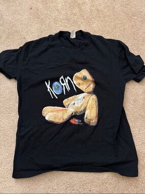 Source Unknown Black Korn Voodoo Doll Graphic Tee